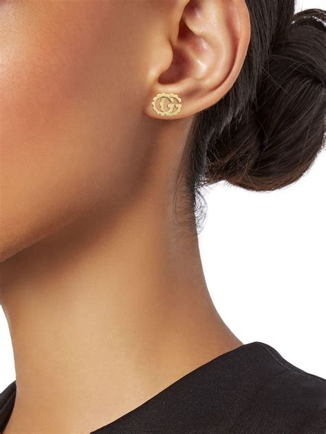 gucci gg diamond stud halo earrings|Gucci gold jewellery earrings.